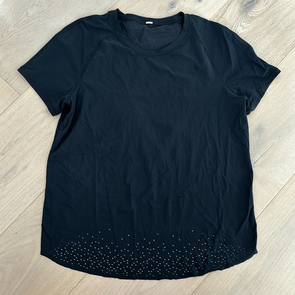 Laser cut open back lulu top